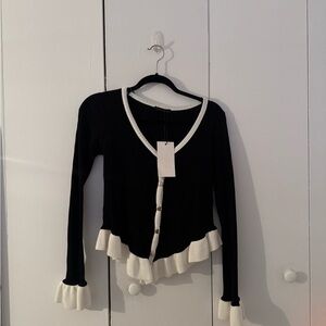 Zara black and white button cardigan with ruffle detail